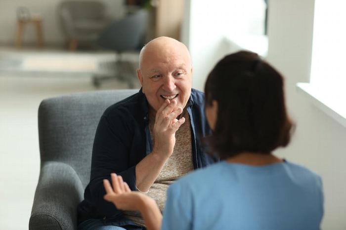 Man talking to therapist